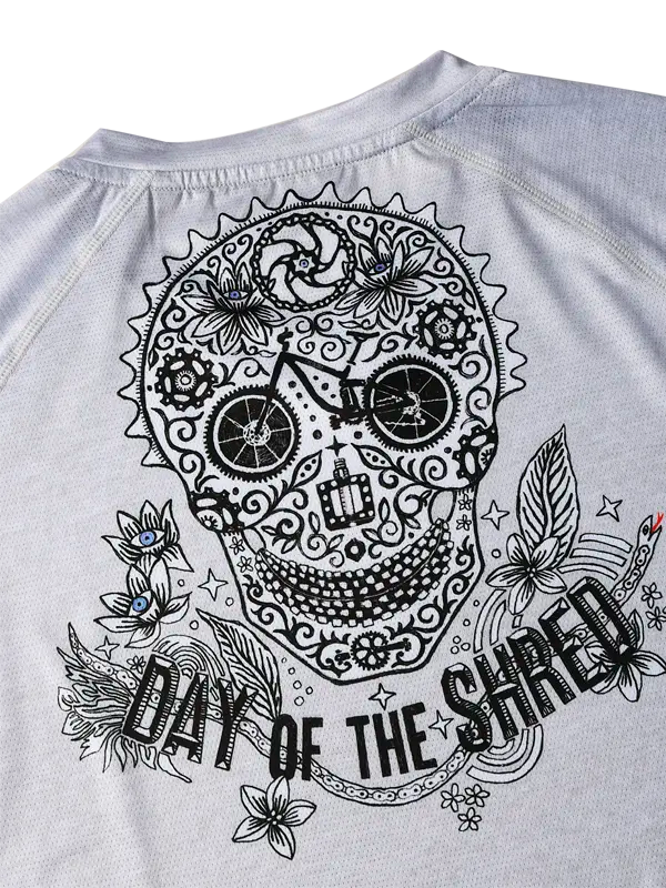 Gray MTB JERSEY with a black skull design and 'Day of the Shred' text 